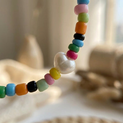 Colorful Boho Beaded Bracelet – Rainbow Beads with White Centerpiece, Handmade Elastic Casual Jewelry