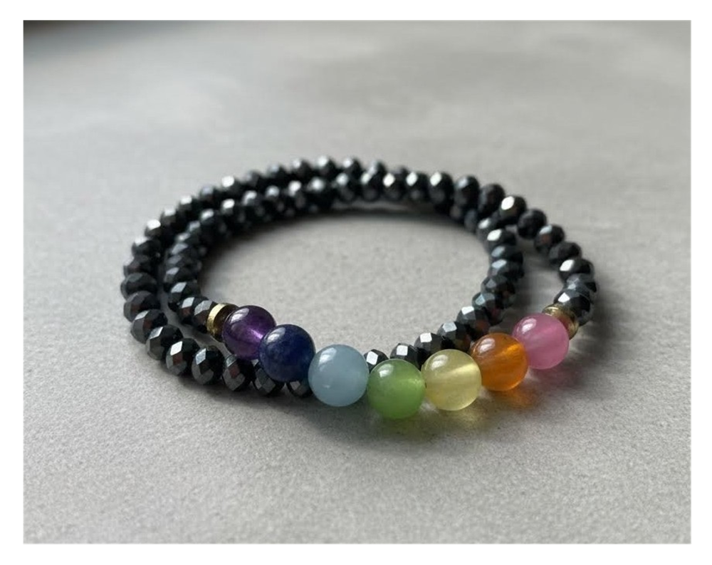 Multicolored beaded bracelet on a light gray background