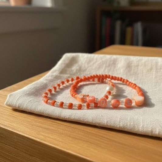 handmade orange beaded bracelet butterfy charm