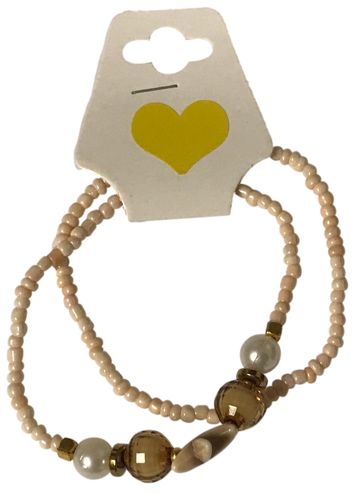 Set of beaded bracelets on a card with a heart design