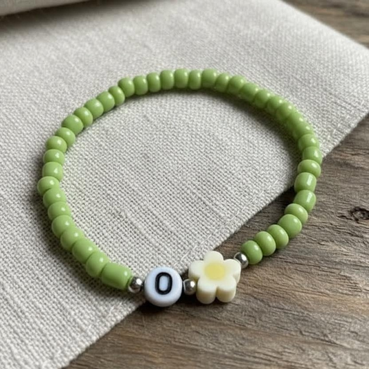 Green Seed Bead Daisy Bracelet with Initial O, Cute Personalized Stretch Jewelry, Symbol of Growth & Happiness Gift