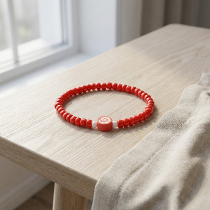 Handmade Red Beaded Bracelet with Spiral Charm – Elastic Jewelry with White Accent Beads