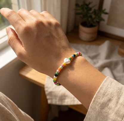Colorful Boho Beaded Bracelet – Rainbow Beads with White Centerpiece, Handmade Elastic Casual Jewelry