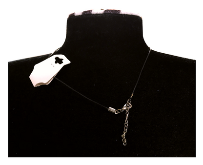 Necklace with a chain detail on a black mannequin bust.