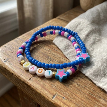 Handmade Beaded Friendship Bracelet Set (2 pcs) – Multicolor “LOVE” Letters, Pink & Blue Star Beads, Gold Accents, Playful Gift for Kids/Teens