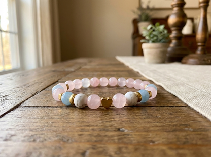 Multicolored beaded bracelet on a wooden table with a soft focus background