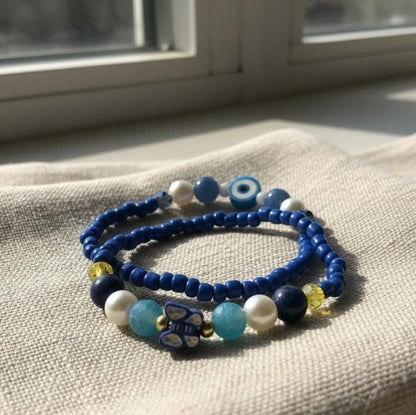 Handmade 2-Piece Blue Beaded Bracelet Set with Pearl-Style, Evil Eye & Butterfly Accents – Gift Jewelry, Boho Fashion Style