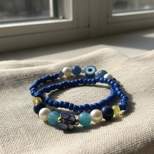 Handmade 2-Piece Blue Beaded Bracelet Set with Pearl-Style, Evil Eye & Butterfly Accents – Gift Jewelry, Boho Fashion Style