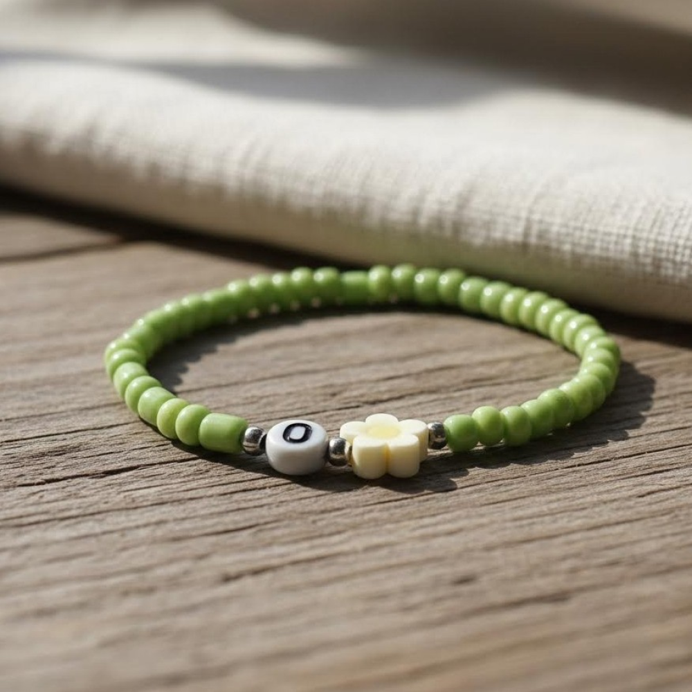 Green Seed Bead Daisy Bracelet with Initial O, Cute Personalized Stretch Jewelry, Symbol of Growth & Happiness Gift