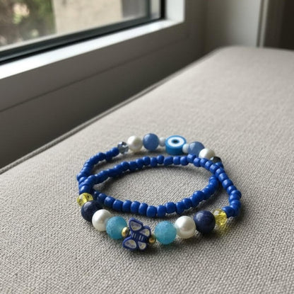 Handmade 2-Piece Blue Beaded Bracelet Set with Pearl-Style, Evil Eye & Butterfly Accents – Gift Jewelry, Boho Fashion Style