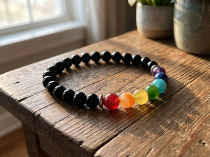 Colorful beaded bracelet on a wooden surface with a blurred background