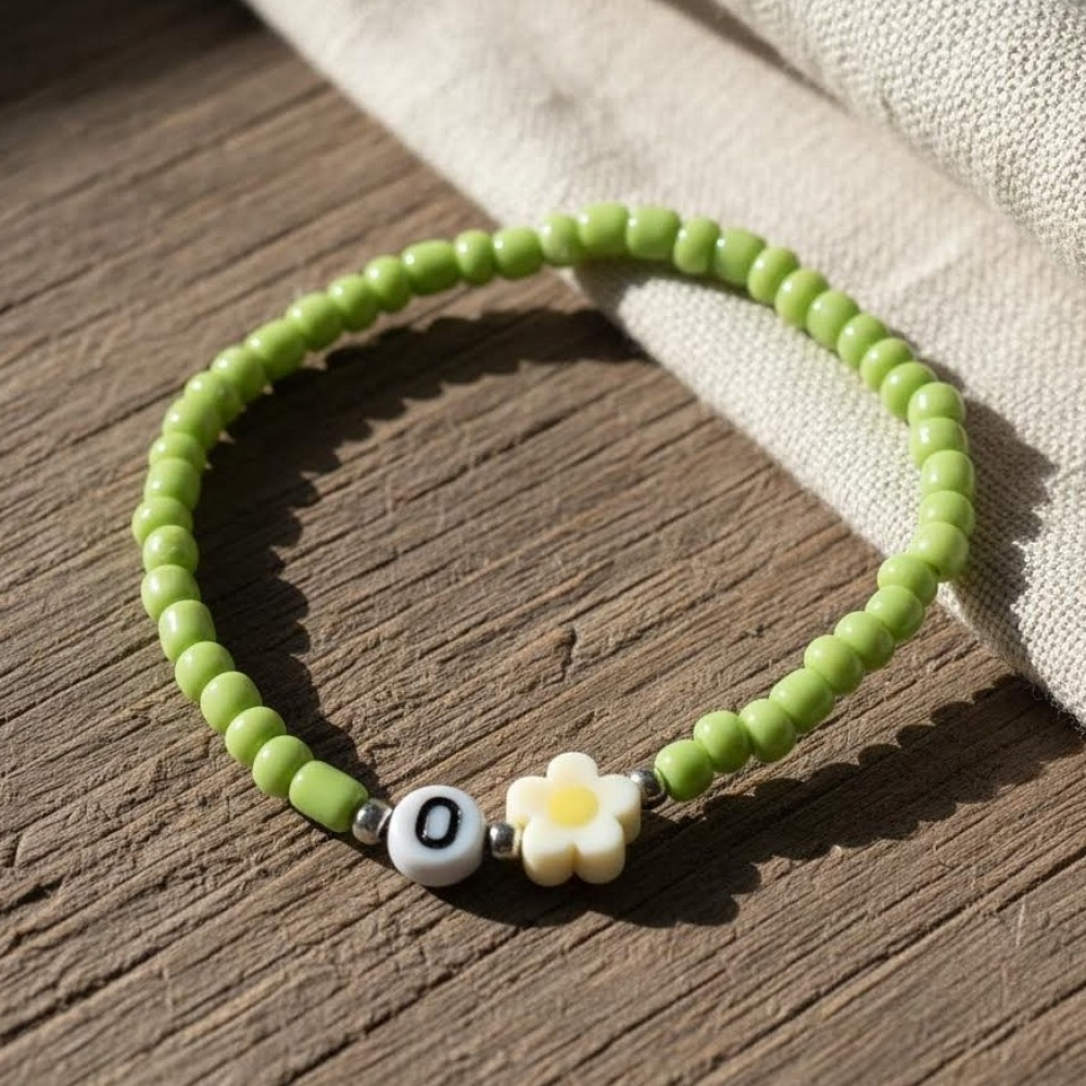 Green Seed Bead Daisy Bracelet with Initial O, Cute Personalized Stretch Jewelry, Symbol of Growth & Happiness Gift
