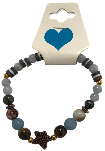 Beaded bracelet with star charm on a card with blue heart