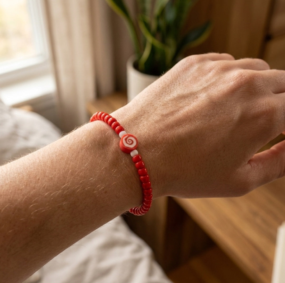 Handmade Red Beaded Bracelet with Spiral Charm – Elastic Jewelry with White Accent Beads