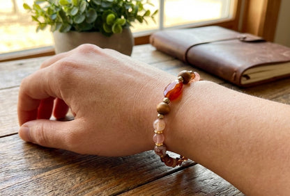 Handmade Beaded Bracelet with Warm Brown, Pink & Red Tones and Red Gemstone-Style Centerpiece – Earthy Autumn Jewelry