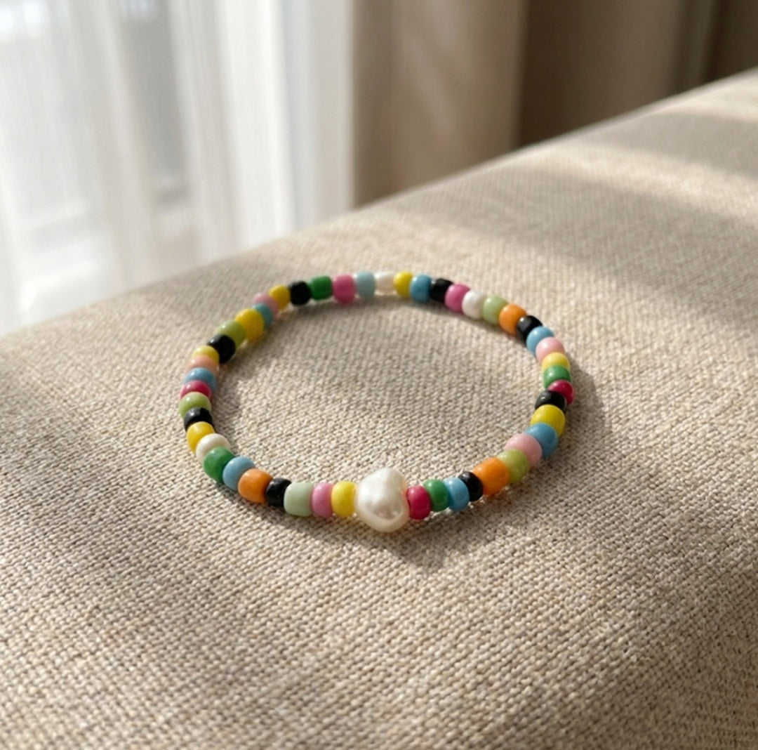 Colorful Boho Beaded Bracelet – Rainbow Beads with White Centerpiece, Handmade Elastic Casual Jewelry