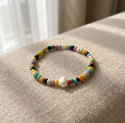 Colorful Boho Beaded Bracelet – Rainbow Beads with White Centerpiece, Handmade Elastic Casual Jewelry