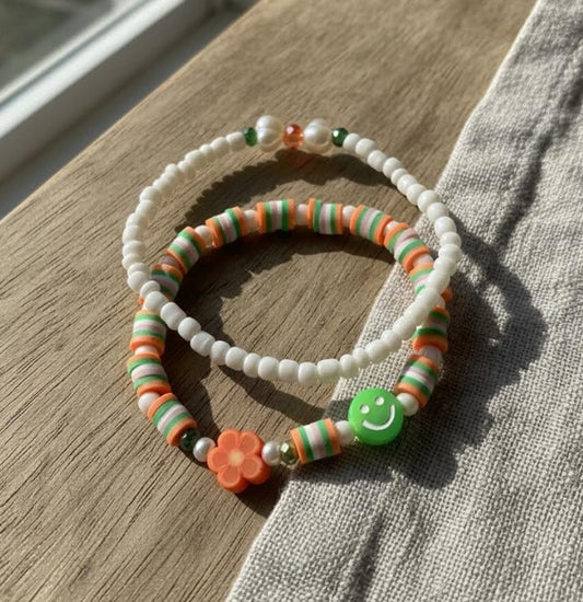 Handmade 2-Piece Bracelet Set with White Beads, Orange & Green Accents, Flower & Smiley Charms – Gift Jewelry, Boho Chic Style