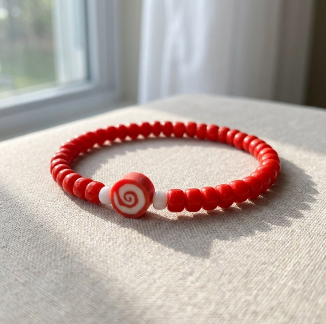 Handmade Red Beaded Bracelet with Spiral Charm – Elastic Jewelry with White Accent Beads
