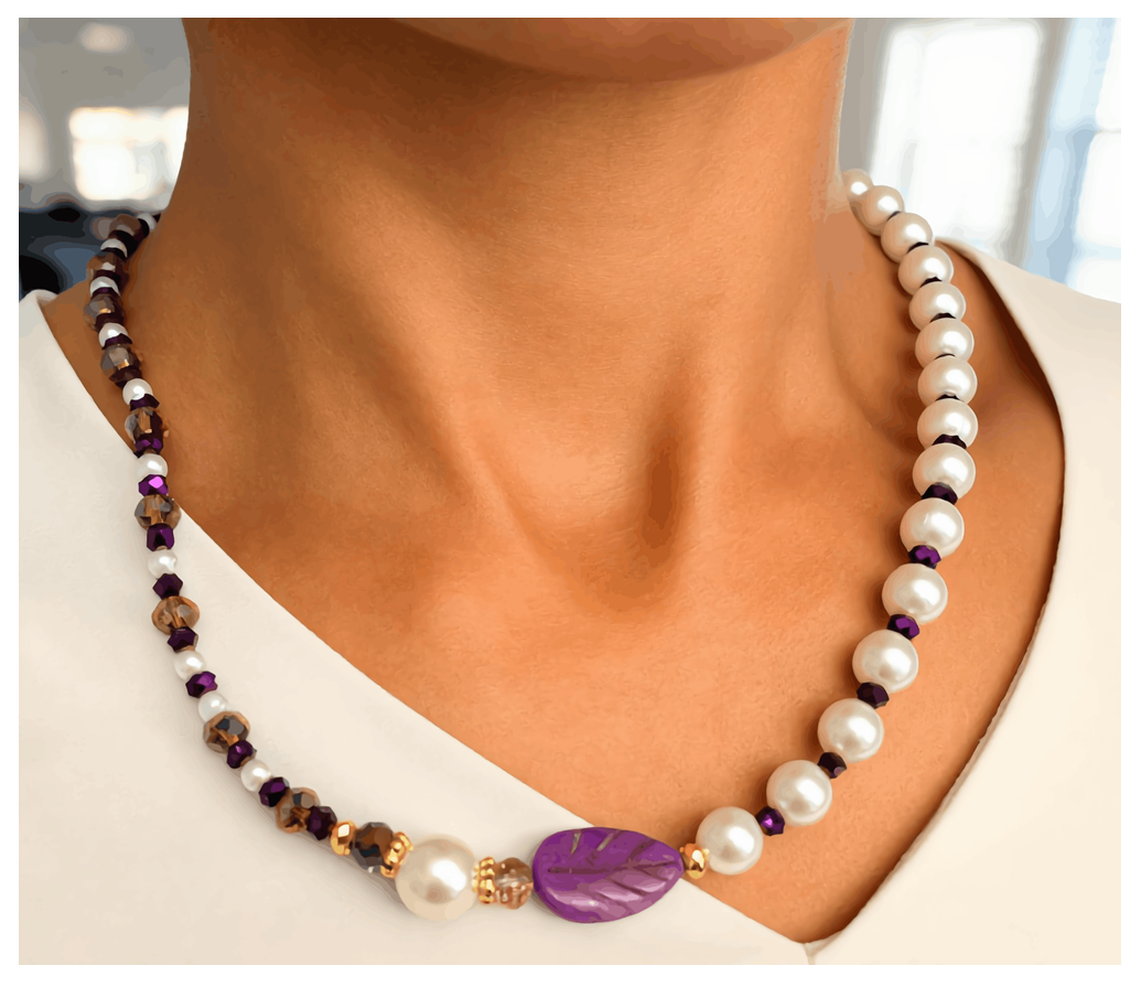 Pearl necklace with purple leaf pendant worn by a person