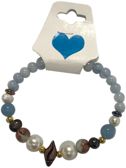 Beaded bracelet with a heart-shaped tag on a white background