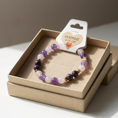 Beaded bracelet on a cardboard box with a 'Handmade with Love' tag.
