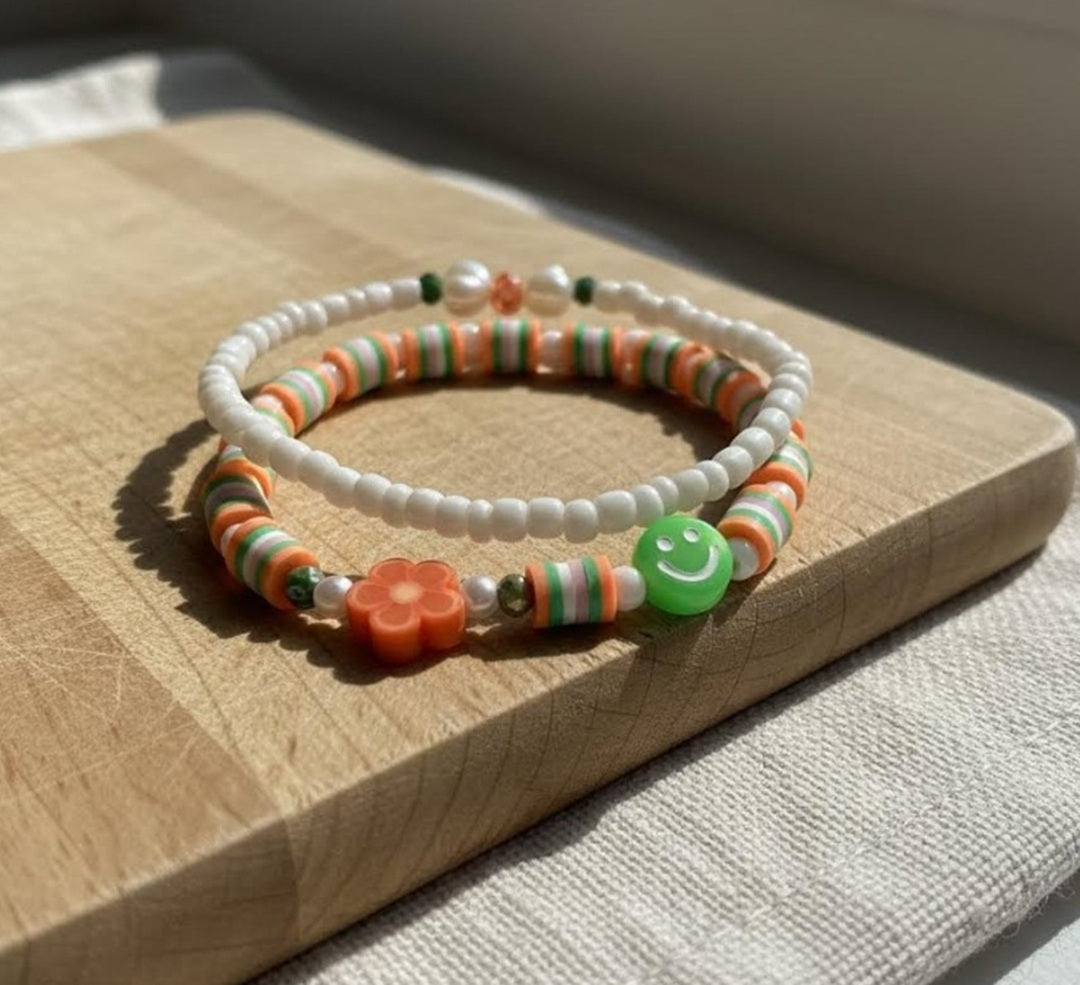 Handmade 2-Piece Bracelet Set with White Beads, Orange & Green Accents, Flower & Smiley Charms – Gift Jewelry, Boho Chic Style